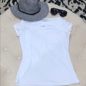 BNWOT White slim top with décolletage cut out